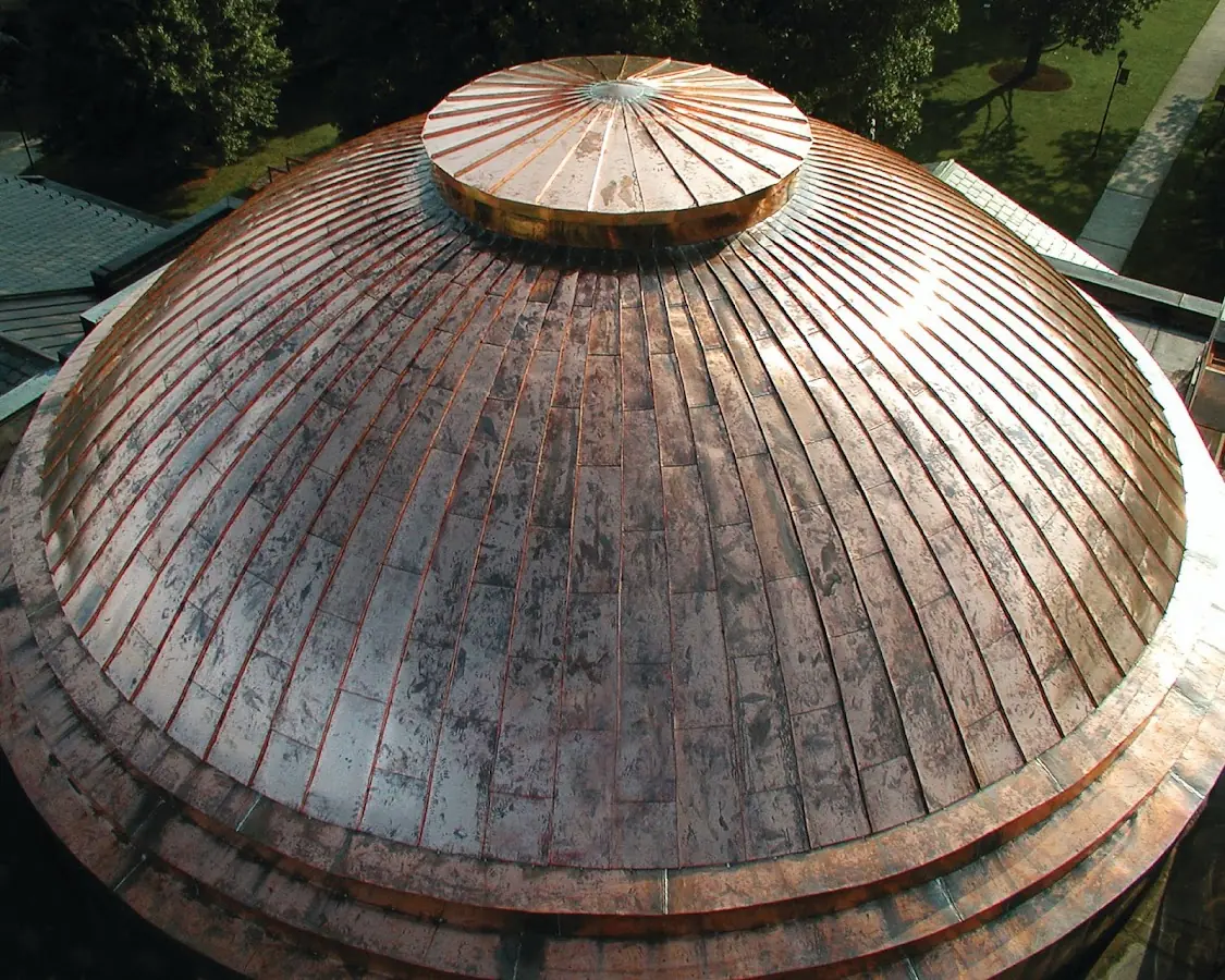 Craftsman Roofing crew installing a new roof in Warren